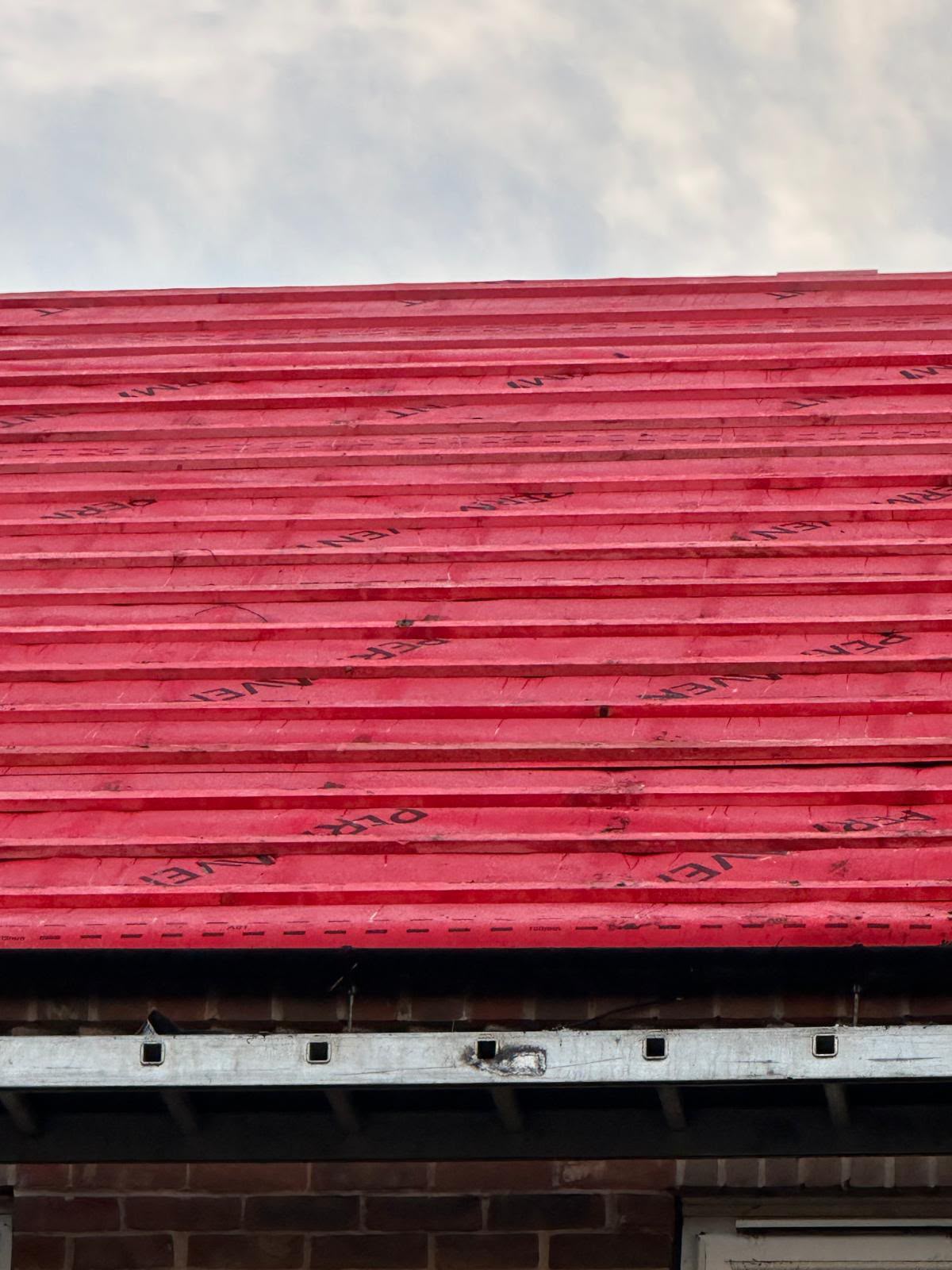 Close-up detail of eaves ventilation, membrane and battens on a new roof